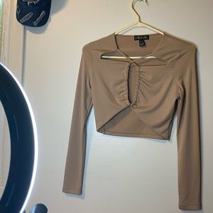 Brand new never worn from urban planet, tan colour silk fabric revealing top